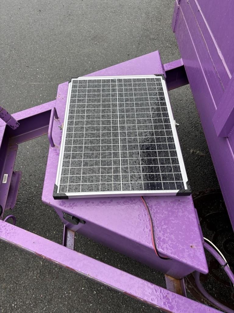 Glass-Recycling-Program-Purple-Trailer-Solar-Panel-Addition-1
